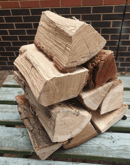 KILN DRIED ASH LOGS IN 25L NETS - 90 - Ready Set SuppliedKILN DRIED ASH LOGS IN 25L NETS - 90